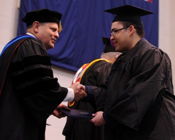 John Avendano and graduate Ric Dean Dela Cruz