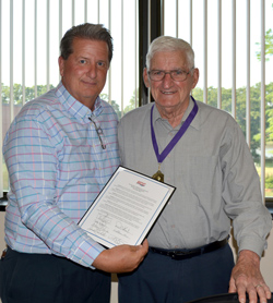 L-R Brad Hove, chairman of KCC’s board of trustees, honored Dick Frey at the meeting on Monday.